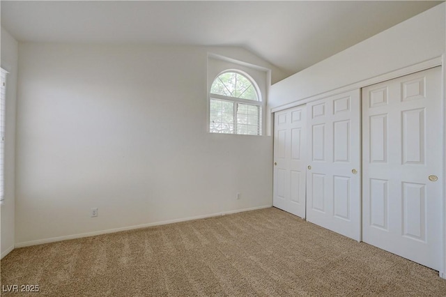 7528 Golden Yucca Dr, Las Vegas, NV 89147 - unfurnished bedroom with carpet, vaulted ceiling, and a closet