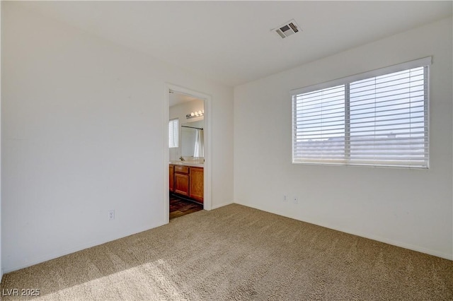 7528 Golden Yucca Dr, Las Vegas, NV 89147 - unfurnished bedroom with carpet and ensuite bathroom