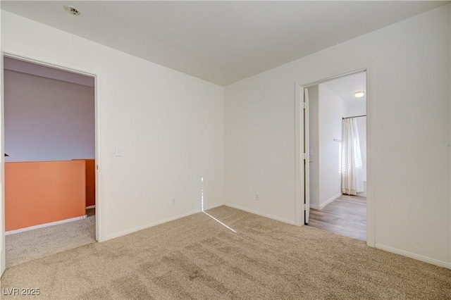 7528 Golden Yucca Dr, Las Vegas, NV 89147 - spare room featuring carpet and baseboards