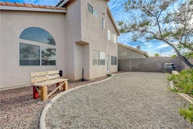 7528 Golden Yucca Dr, Las Vegas, NV 89147 - view of home's exterior featuring stucco siding and a fenced backyard