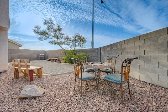 7528 Golden Yucca Dr, Las Vegas, NV 89147 - fenced backyard with a patio
