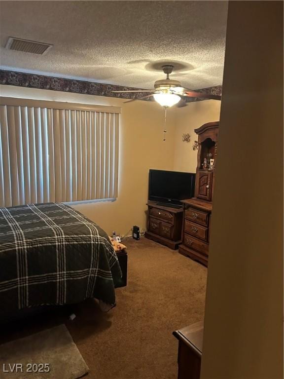 712 Donner St, Las Vegas, NV 89107 - carpeted bedroom with a textured ceiling