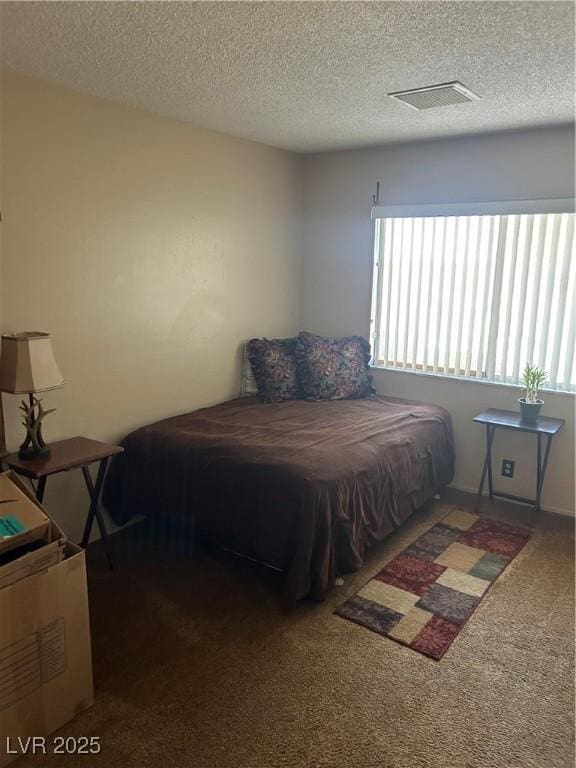 712 Donner St, Las Vegas, NV 89107 - bedroom with carpet floors and a textured ceiling