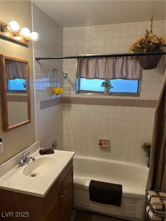 712 Donner St, Las Vegas, NV 89107 - full bathroom with vanity and shower / bath combo with shower curtain