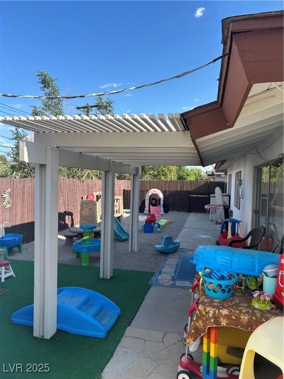 712 Donner St, Las Vegas, NV 89107 - fenced backyard with a patio