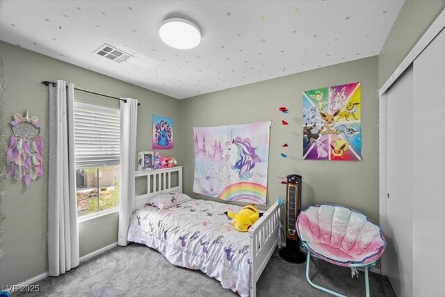 106 Basketflower Ct, Las Vegas, NV 89183 - bedroom with carpet flooring, baseboards, and a closet