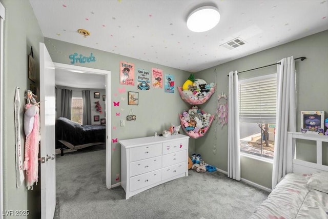 106 Basketflower Ct, Las Vegas, NV 89183 - bedroom featuring multiple windows, light colored carpet, and baseboards