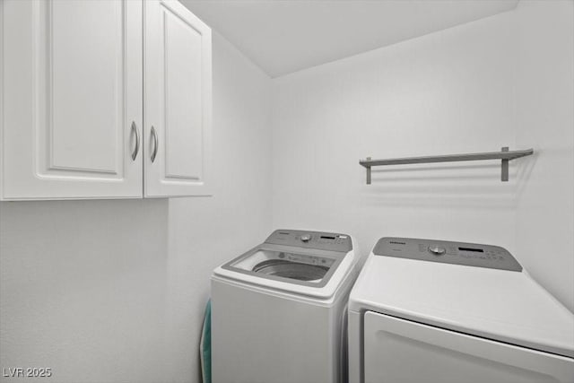106 Basketflower Ct, Las Vegas, NV 89183 - laundry area featuring cabinet space and washer and clothes dryer