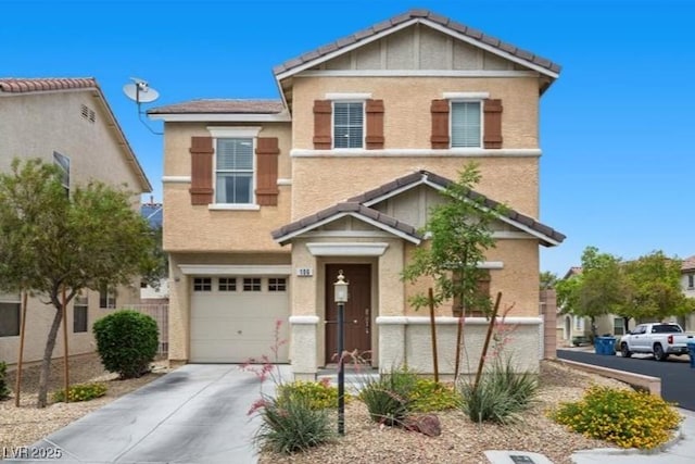 106 Basketflower Ct, Las Vegas, NV 89183 - view of front of property featuring a garage, stucco siding, and concrete driveway