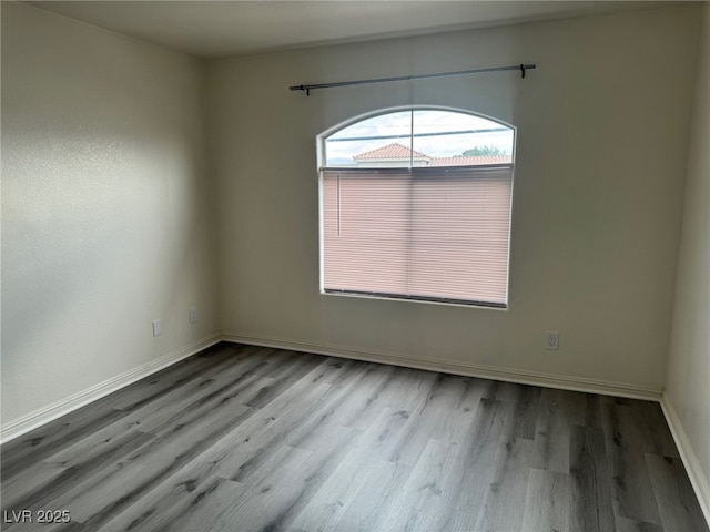 4555 E Sahara Ave Unit 288, Las Vegas, NV 89104 - empty room featuring wood finished floors and baseboards