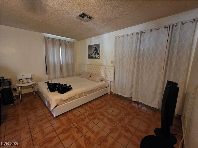 7108 Moon Ct, Las Vegas, NV 89145 - bedroom with a textured ceiling and tile patterned flooring
