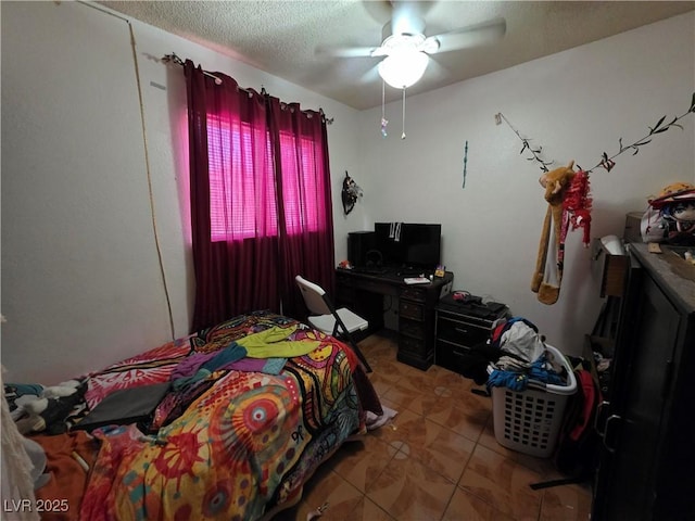 7108 Moon Ct, Las Vegas, NV 89145 - tiled bedroom featuring ceiling fan and a textured ceiling