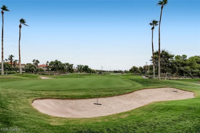 1609 Hidden Spring Dr, Las Vegas, NV 89117 - view of property's community with golf course view, a putting green, and a lawn