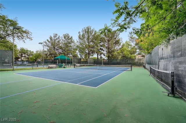1609 Hidden Spring Dr, Las Vegas, NV 89117 - view of tennis court with community basketball court