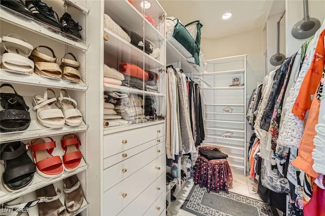1609 Hidden Spring Dr, Las Vegas, NV 89117 - walk in closet featuring tile patterned floors