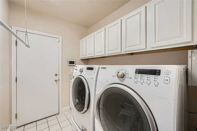 1609 Hidden Spring Dr, Las Vegas, NV 89117 - laundry room featuring washing machine and dryer, cabinet space, and light tile patterned floors