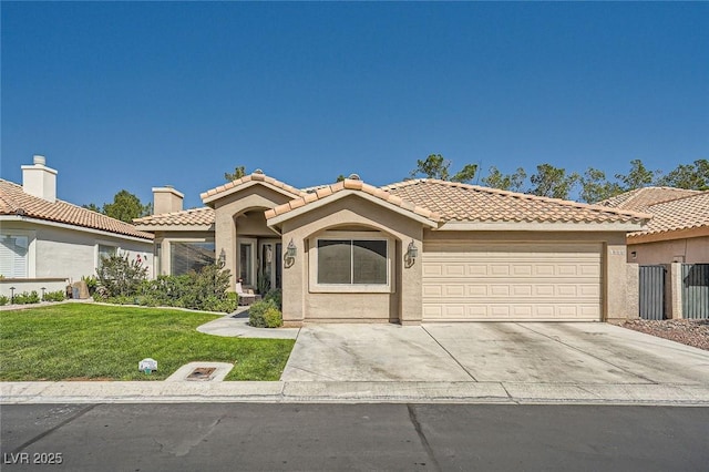 1609 Hidden Spring Dr, Las Vegas, NV 89117 - mediterranean / spanish-style house with a garage, a tile roof, a front lawn, stucco siding, and driveway