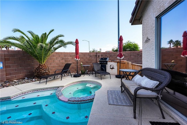 3913 Lilac Haze St, Las Vegas, NV 89147 - view of pool with a patio area, a pool with connected hot tub, and a grill