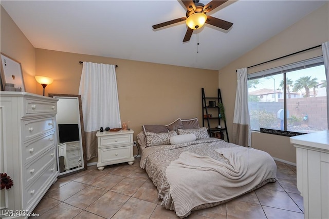 3913 Lilac Haze St, Las Vegas, NV 89147 - bedroom featuring lofted ceiling, light tile patterned floors, and a ceiling fan