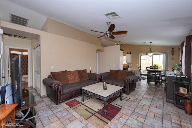 3913 Lilac Haze St, Las Vegas, NV 89147 - living area with a ceiling fan and light stone finish floors