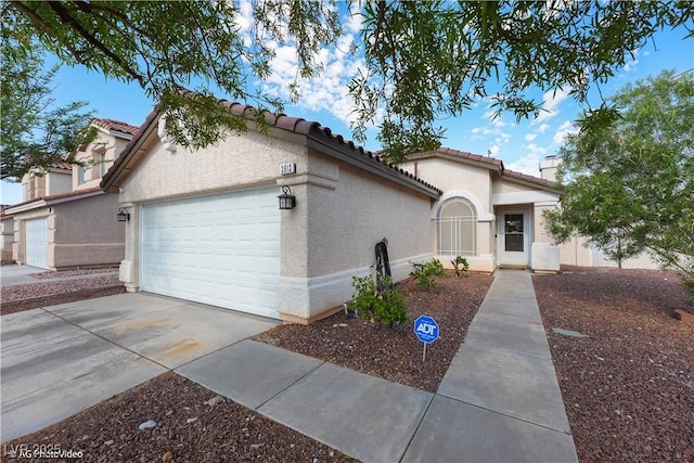 3913 Lilac Haze St, Las Vegas, NV 89147 - view of front of house featuring an attached garage, driveway, stucco siding, a tiled roof, and a chimney