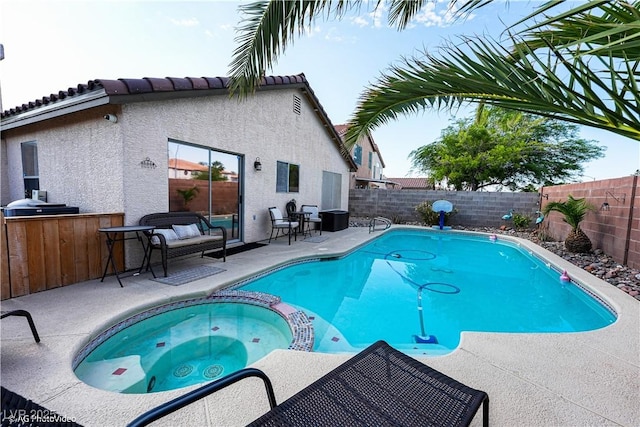 3913 Lilac Haze St, Las Vegas, NV 89147 - view of swimming pool featuring a fenced backyard, a patio area, and a pool with connected hot tub