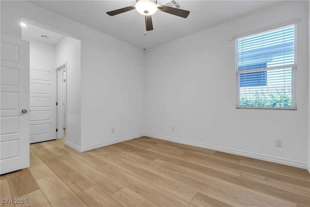 9570 Thistle Creek Ave, Las Vegas, NV 89178 - unfurnished room featuring light wood finished floors, ceiling fan, and baseboards