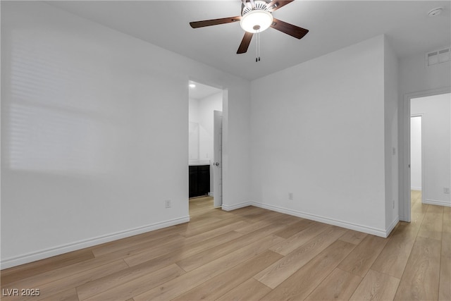 9570 Thistle Creek Ave, Las Vegas, NV 89178 - unfurnished room featuring light wood-style floors, a ceiling fan, baseboards, and a smoke detector
