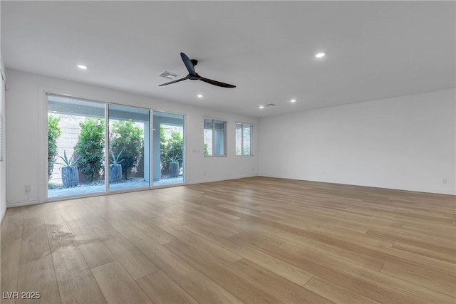 9570 Thistle Creek Ave, Las Vegas, NV 89178 - empty room with light wood finished floors, ceiling fan, recessed lighting, and baseboards