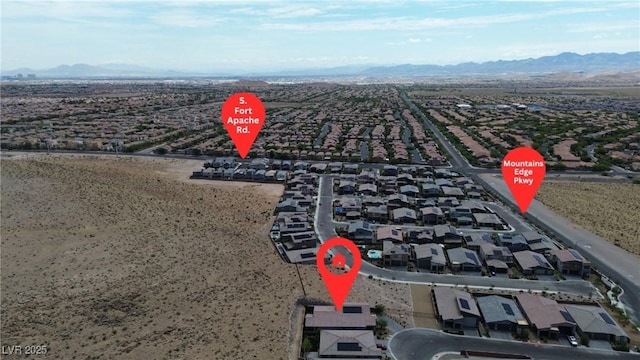 9570 Thistle Creek Ave, Las Vegas, NV 89178 - aerial perspective of suburban area featuring a mountain backdrop