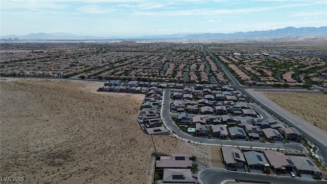 9570 Thistle Creek Ave, Las Vegas, NV 89178 - aerial perspective of suburban area with mountains