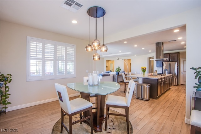 8298 W Agate Ave, Las Vegas, NV 89113 - dining space featuring light wood-style flooring and recessed lighting