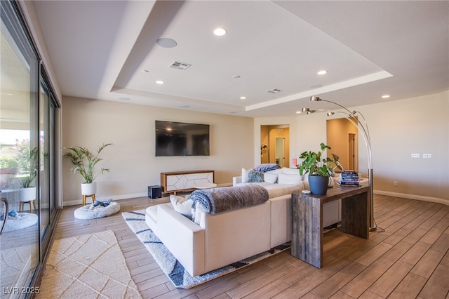 8298 W Agate Ave, Las Vegas, NV 89113 - living area featuring a raised ceiling, light wood-style flooring, and recessed lighting