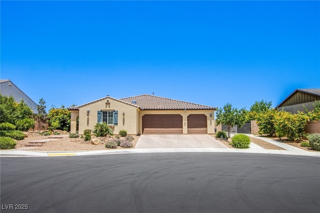 8298 W Agate Ave, Las Vegas, NV 89113 - view of front of house featuring an attached garage, stucco siding, a tiled roof, and concrete driveway