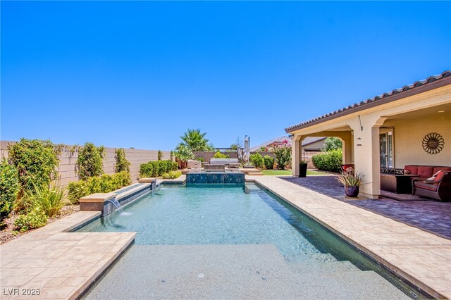 8298 W Agate Ave, Las Vegas, NV 89113 - view of pool with a patio area, a fenced backyard, and a pool with connected hot tub