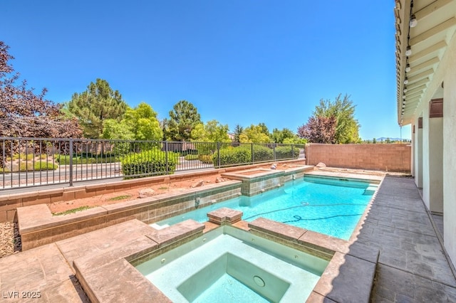 5396 Splendido Ave, Pahrump, NV 89061 - view of swimming pool featuring a fenced backyard and a pool with connected hot tub