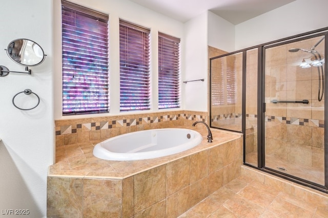5396 Splendido Ave, Pahrump, NV 89061 - bathroom with a bath, a stall shower, and tile patterned flooring
