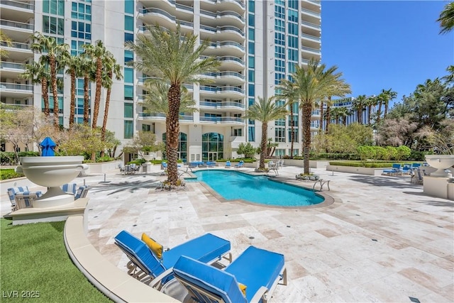 2777 Paradise Rd Unit 1002, Las Vegas, NV 89109 - community pool featuring a patio area