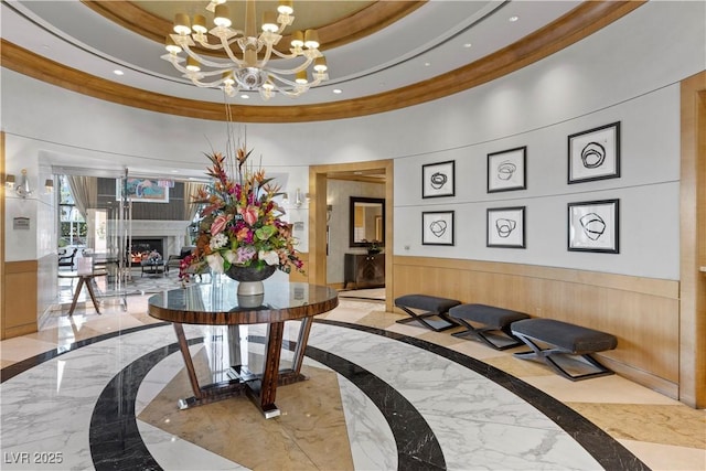 2777 Paradise Rd Unit 1002, Las Vegas, NV 89109 - building lobby with ornamental molding, recessed lighting, and a wainscoted wall
