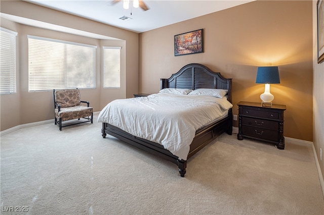 9077 Creed Mountain Pl, Las Vegas, NV 89178 - bedroom with light colored carpet, baseboards, and a ceiling fan