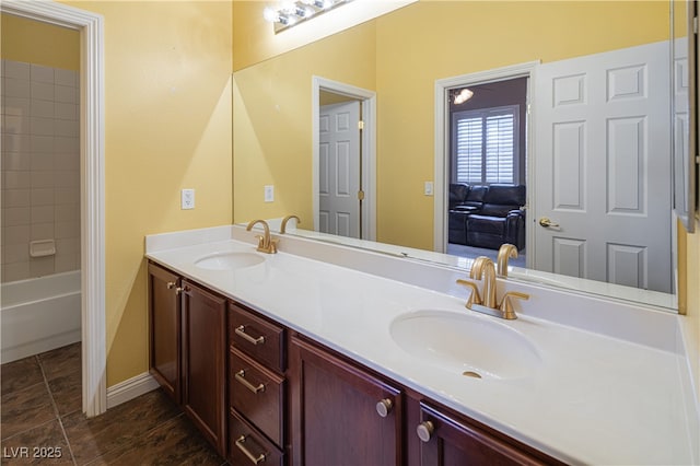 9077 Creed Mountain Pl, Las Vegas, NV 89178 - full bath with double vanity and baseboards