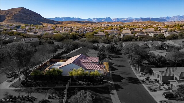 9077 Creed Mountain Pl, Las Vegas, NV 89178 - aerial view of residential area with a mountainous background