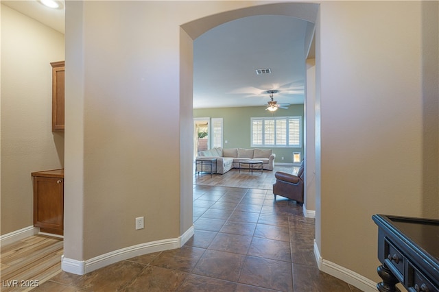 9077 Creed Mountain Pl, Las Vegas, NV 89178 - hallway featuring arched walkways and baseboards