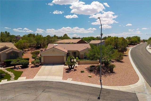 1620 Fieldbrook St, Henderson, NV 89052 - mediterranean / spanish house featuring concrete driveway, an attached garage, and a tile roof