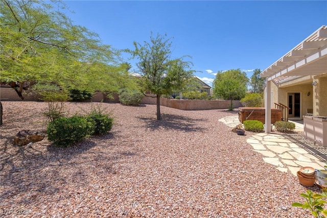 1620 Fieldbrook St, Henderson, NV 89052 - fenced backyard with a hot tub and a patio area