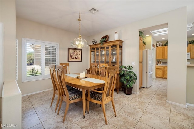 1620 Fieldbrook St, Henderson, NV 89052 - dining area featuring light tile patterned floors and baseboards