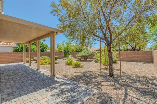 4369 Meadowlark Wing Way N, Las Vegas, NV 89084 - fenced backyard featuring a patio area