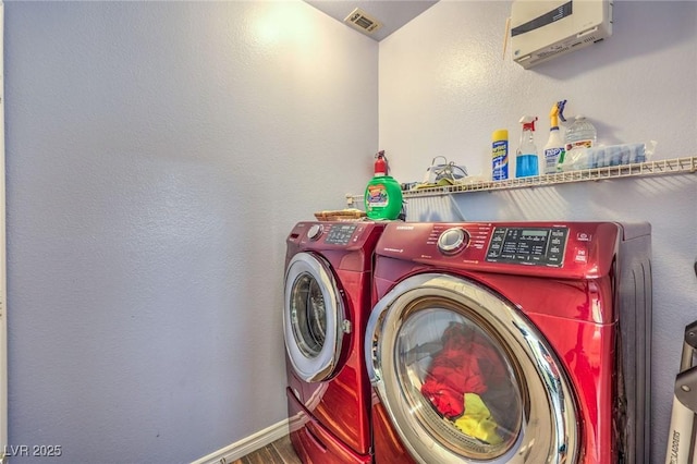 979 Coatbridge St, Las Vegas, NV 89145 - laundry room featuring independent washer and dryer and wood finished floors