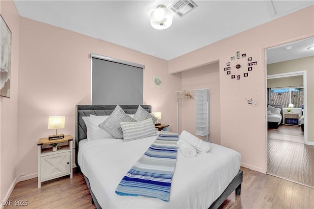 3659 Gerri Bay Ln, Las Vegas, NV 89147 - bedroom featuring wood finished floors and baseboards