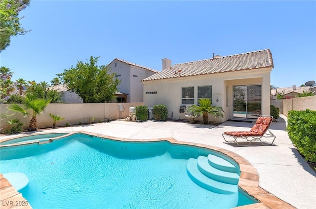 8312 Raphael Ct, Las Vegas, NV 89129 - view of swimming pool featuring a patio area and a pool with connected hot tub